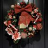 kerst-krans-kerstkrans-hotel chique-christmas-santa-door-christmasdoor-red-rood-zuurstok-notenkrakers-bessen